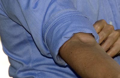 How to Roll Up Your Dress Shirt Sleeves Without Looking Sloppy