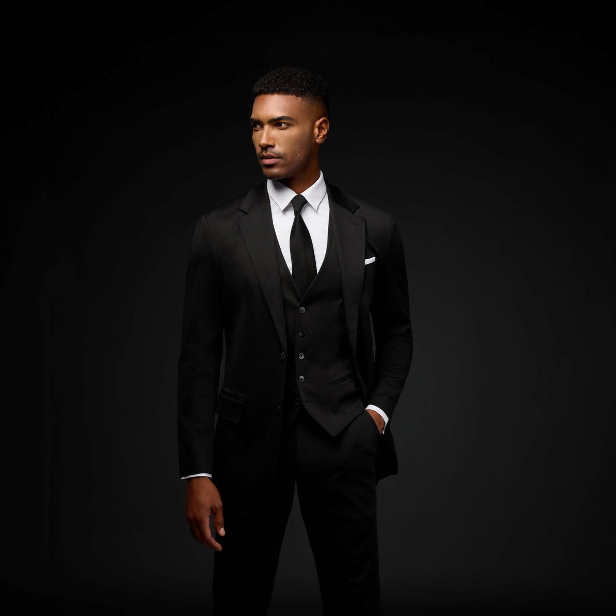 What Color Tie to Wear with a Black Suit? What Color Tie to Wear with a Black Suit?